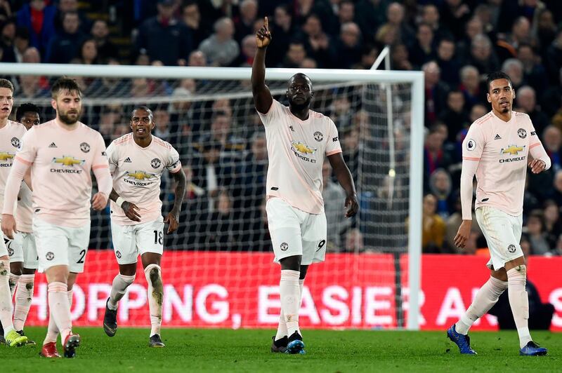 Lukaku acknowledges United fans after scoring his and the team's second. EPA