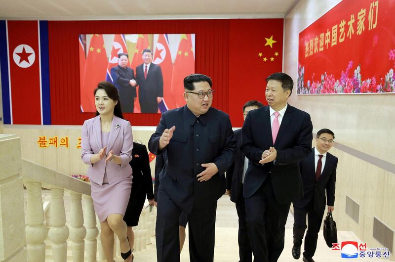 North Korean leader Kim Jong Un meets Song Tao, the head of the China's Communist Party's International Department who led a Chinese art troupe to North Korea for the April Spring Friendship Art Festival, in this handout photo released by North Korea's Korean Central News Agency (KCNA) on April 15, 2018. KCNA/via REUTERS  ATTENTION EDITORS - THIS PICTURE WAS PROVIDED BY A THIRD PARTY. REUTERS IS UNABLE TO INDEPENDENTLY VERIFY THE AUTHENTICITY, CONTENT, LOCATION OR DATE OF THIS IMAGE. NO THIRD PARTY SALES. SOUTH KOREA OUT.     TPX IMAGES OF THE DAY