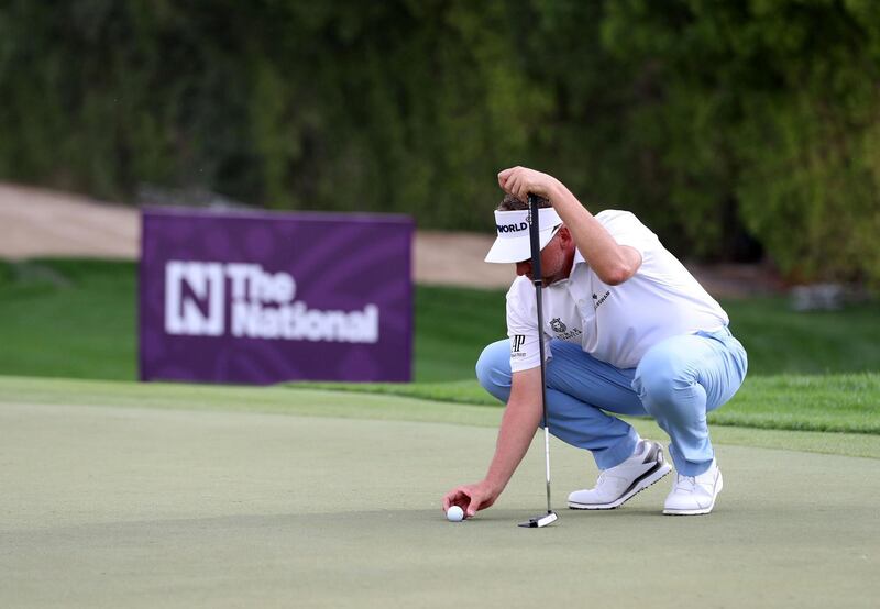 Dubai, United Arab Emirates - Reporter: Paul Radley and John McAuley: Ian Poulter putts on the 12th green on the 1st day of the Omega Dubai Desert Classic. Thursday, January 23rd, 2020. Emirates Golf Club, Dubai. Chris Whiteoak / The National