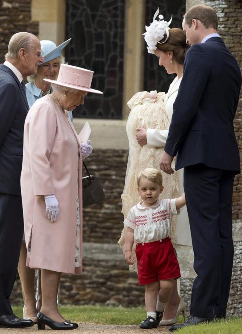 Britain’s Queen Elizabeth II, third left, and from left, Prince Philip, Camilla the Duchess of Cornwall, Kate the Duchess of Cambridge holding Princess Charlotte, Prince George and Prince William aas they leave after attending the Christening of Britain’s Princess Charlotte at St. Mary Magdalene Church in Sandringham, England on July 5, 2015. Matt Dunham / AP photo