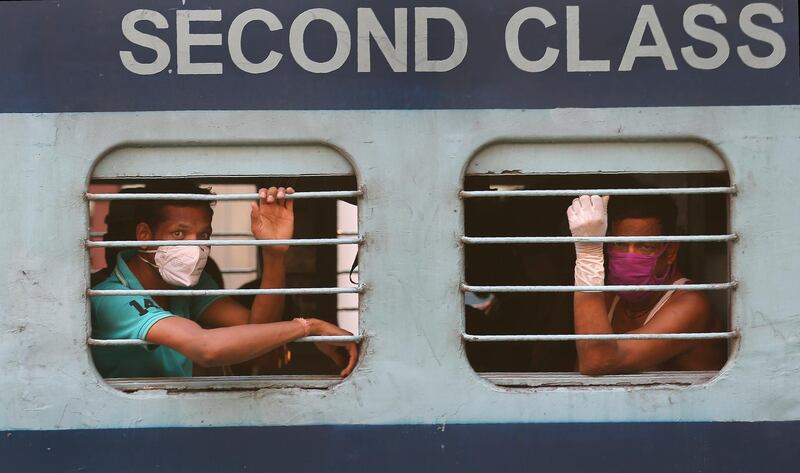 Indian migrant workers onboard a train in Hyderabad, India as they return to their villages, May 23. Mahesh Kumar A/ AP
