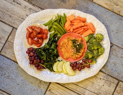 Kale crisps and crudites with sweet and smoky carrot and butterbean dip. Photo: Scott Price
