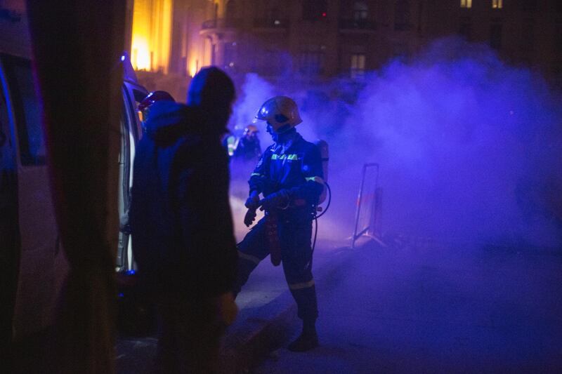 Teargas engulfs Red Cross medics as anti government protesters and riot police clash during a second day of violence. Getty Images