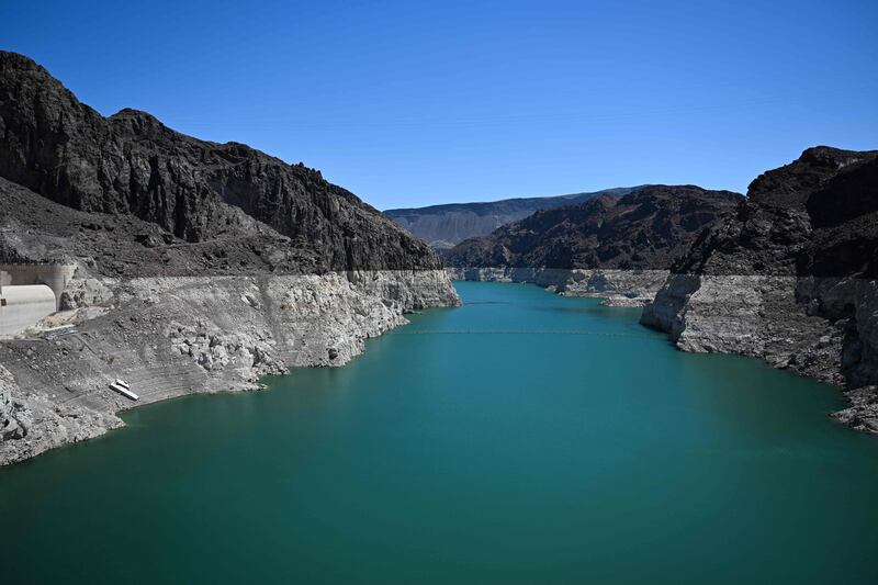 A white band of mineral deposits shows Lake Mead's previous water levels. AFP