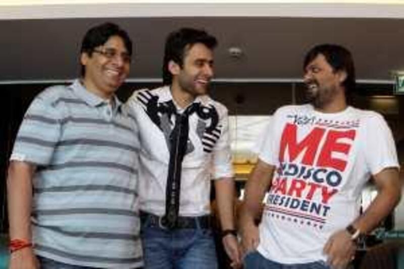 Dubai, 7th June 2009.  (Left to right) Vashu Bhagnani (Film Producer), Jackky Bhagnani (Actor) and Sajid Wajid (Musical Director) Having a light moment, prior to their individual interviews for the movie, Kal Kissne Dekha.  Held at the Intercontinental Hotel, Dubai Festival City.  (Jeffrey E Bitreng / The National)  Editor's Note; Praveen M reports. *** Local Caption ***  JB06-Bollywood.jpg