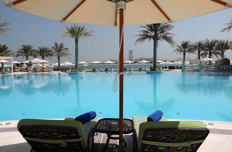 Raffles The Palm Dubai offers a 500-metre private beach, a large swimming pool and a Cinq Mondes Spa