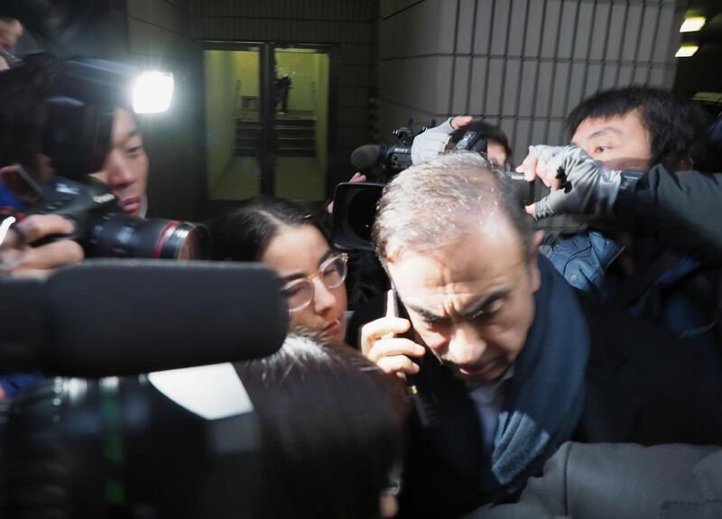 Former Nissan Chairman Carlos Ghosn leaves his lawyer Junichiro Hironaka's office in Tokyo on March 12, 2019. Japan OUT
 / AFP / JIJI PRESS / JIJI PRESS
