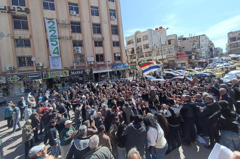 A demonstration against Syrian President Bashar Al Assad, in the mostly Druze southern city of Suweida. AFP