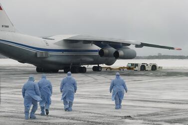 Medical staff members walking towards a military plane, which evacuated citizens of Russia and ex-Soviet countries from China's Wuhan province, the epicentre of an outbreak of the coronavirus epidemic. Reuters.