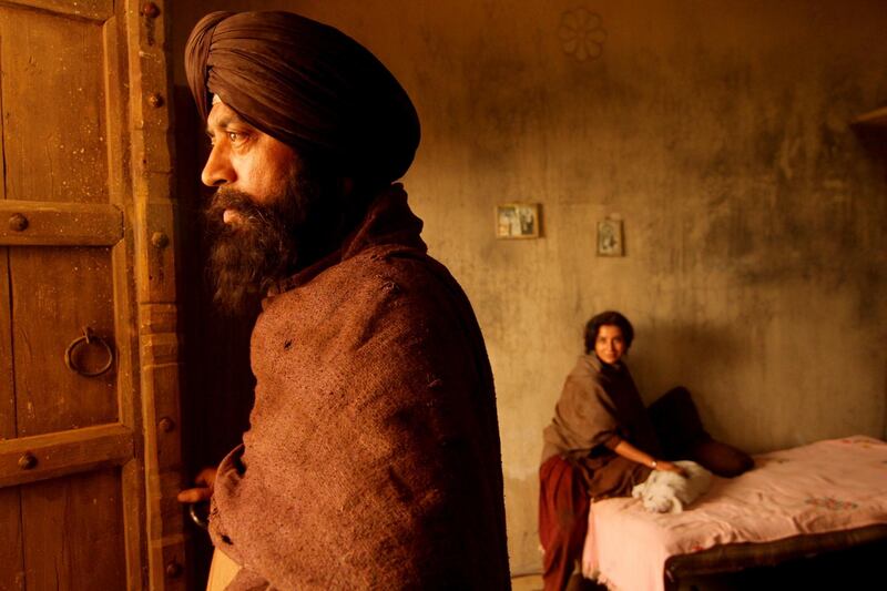 The film Qissa is about a Sikh named Umber Singh (Irrfan Khan, at left) who was forced to flee from his village during the partitioning of India in 1947. He has three daughters but wishes to have a male heir.
CREDIT: Courtesy Heimatfilm *** Local Caption ***  al20oc-IrrfanKhan.jpg