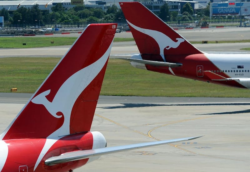 Qantas has said it will start voluntary redundancies of pilots as it aims to cut costs. Torsten Blackwood / AFP