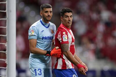 Villarreal goalkeeper Geronimo Rulli and Luis Suarez of Atletico Madrid. Getty Images