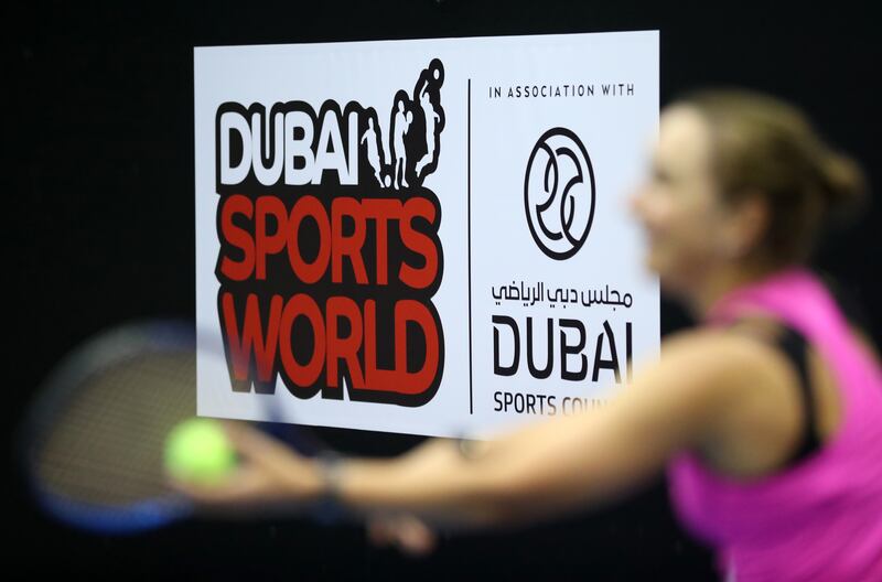 Visitors play tennis at Dubai Sports World in its first week of opening this year.