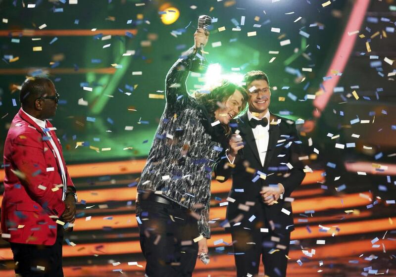 American Idol winner Caleb Johnson with Randy Jackson, left and Ryan Seacrest. Mario Anzouni / Reuters