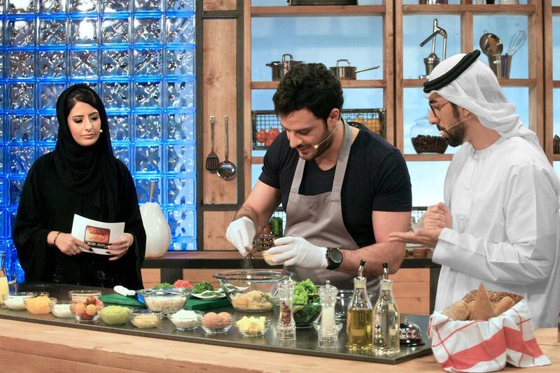Asmahan Alnaqbi, left, Addie Diab, centre, and Ibrahim Al Khamiri, right, are seen during a segment from the TV show 'Boulevard Abu Dhabi' to be aired on the Abu Dhabi TV Channel. Courtesy Abu Dhabi Media