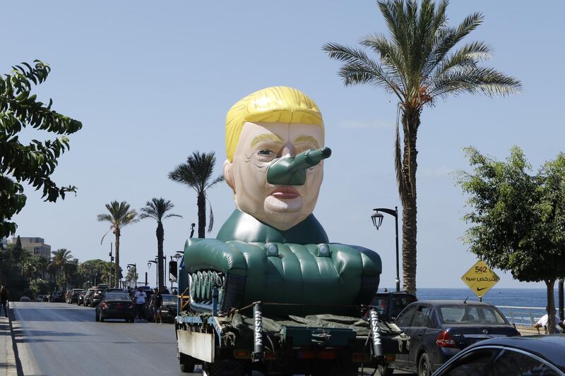 The inflated tank topped with Trump's head has been roaming Beirut's streets and is part of an upcoming exhibition in the Lebanese capital, by a Syrian artist who uses the pseudonym Saint Hoax. Photo Saint Hoax