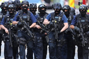 Counter terrorism officers march near London Bridge, the scene of a terrorist attack in 2017. Getty Images