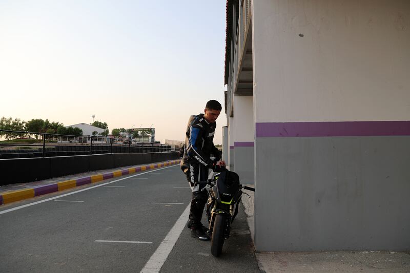 A biker prepares for his ride. 