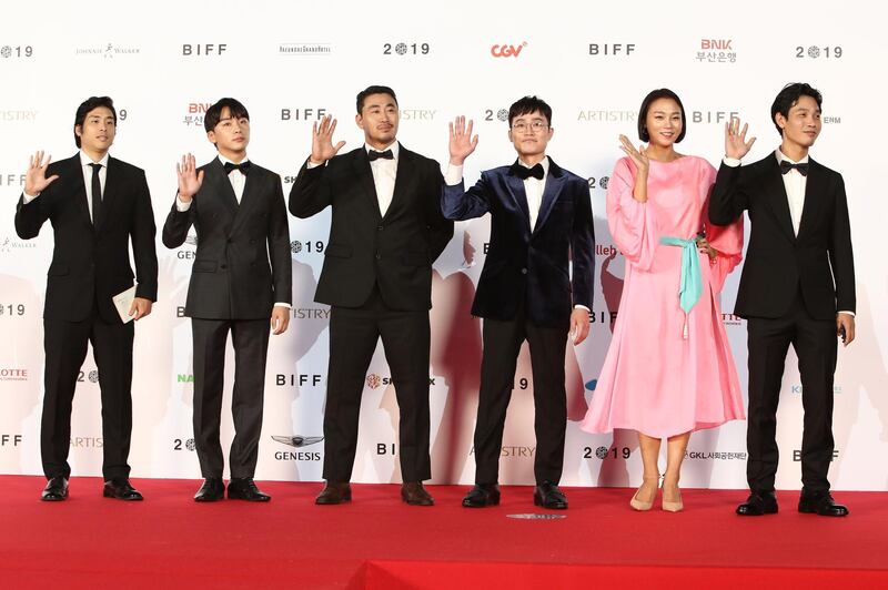 Director Bong Joon-young, actor Kim Do-yoon, Jang Jin-hee, Park Sung-joon, Kim Seung-hyun and Park Sung-il arrive for the Opening Ceremony. Getty Images