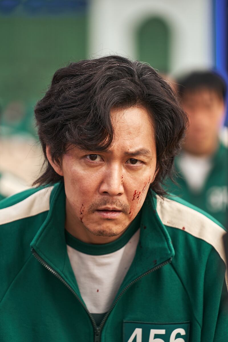 Lee Jung-jae as lead character Seong Gi-hun, a gambling addict.