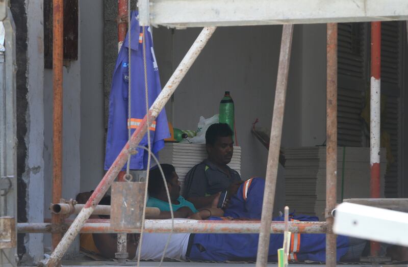 ABU DHABI - UNITED ARAB EMIRATES - 15JUNE2015 - Labourer take their first day of the summer midday break at a construction site on Al Reem Island in Abu Dhabi. Ravindranath K / The National (for News) *** Local Caption ***  RK1506-Middaybreak03.jpg