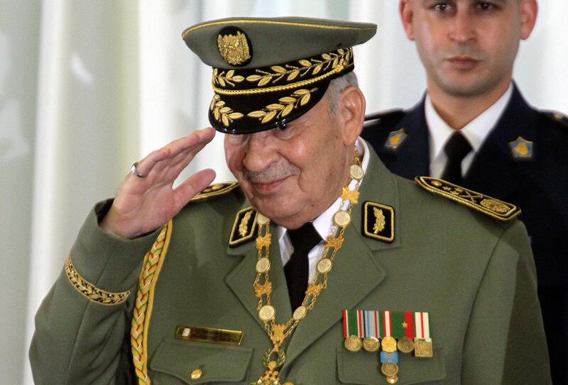 FILE - In this photo taken Thursday, Dec. 19, 2019, Algerian military chief Gen. Ahmed Gaid Salah attends president Abdelmajid Tebboune's inauguration ceremony in the presidential palace, in Algiers. Algeria's powerful military chief died unexpectedly Monday, according to government media reports, leaving his country gripped by political uncertainty after 10 months of pro-democracy protests. (AP Photo/Fateh Guidoum, File)