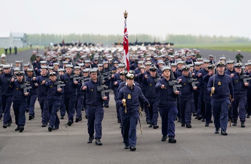 Members of the Royal Air Force march.  PA