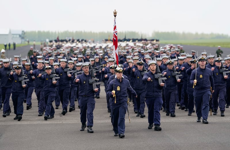 Members of the Royal Air Force march.  PA