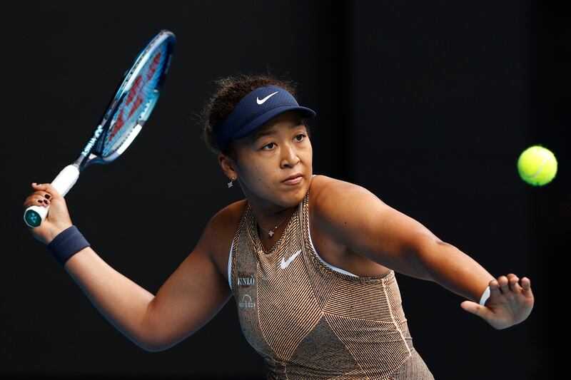 Naomi Osaka plays a forehand to Alize Cornet of France during their Melbourne Summer Set match. Getty
