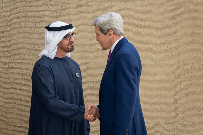 President Sheikh Mohamed greets John Kerry, US Special  Presidential Envoy for Climate. Eissa Al Hammadi / UAE Presidential Court
