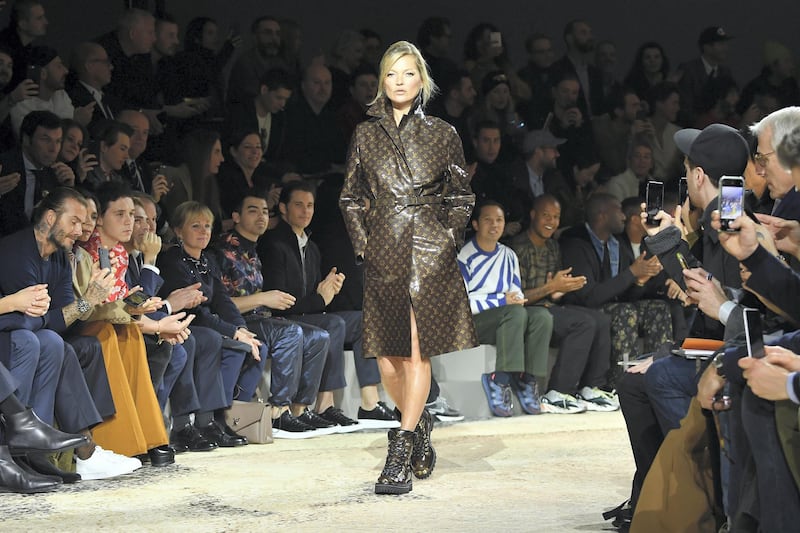 PARIS, FRANCE - JANUARY 18:  Kate Moss walks the runway during the Louis Vuitton   Menswear Fall/Winter 2018-2019 show as part of Paris Fashion Week on January 18, 2018 in Paris, France.  (Photo by Pascal Le Segretain/Getty Images)