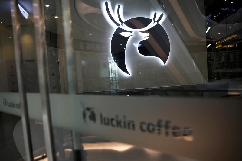 FILE PHOTO: A Luckin Coffee logo is seen at a closed store in Beijing, following the novel coronavirus disease (COVID-19) outbreak, China, April 16, 2020. REUTERS/Tingshu Wang/File Photo