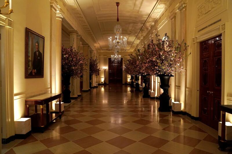 Cherry blossom flowers decorate the Cross Hall for the State Dinner for France's President Emmanuel Macron at the White House in Washington, US, April 23, 2018. Joshua Roberts / Reuters