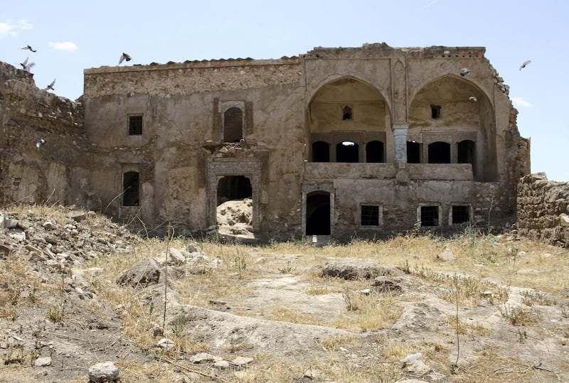 A picture taken on May 8, 2021, shows a view of the ancient citadel of Iraq's northern city of Kirkuk. - In a country that has been battered by years of conflict, government negligence and climate change, Iraq's numerous Christian, Islamic and Mesopotamian rich heritage relics have been left to weather away. (Photo by Shwan NAWZAD / AFP)
