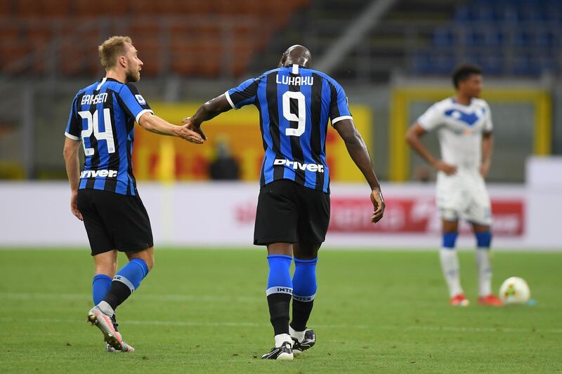 Christian Eriksen celebrates scoring with Romelu Lukaku. Reuters