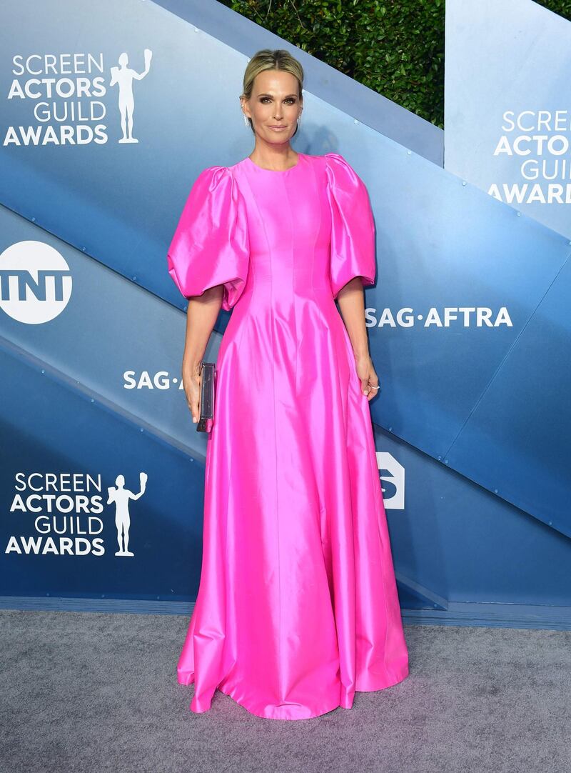 Molly Sims in bold pink at the 26th Annual Screen Actors Guild Awards at the Shrine Auditorium in Los Angeles on January 19, 2020. AFP