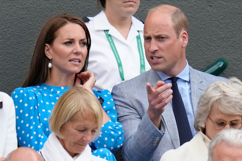 Prince William and Kate, Duchess of Cambridge sit on No 1 Court during the men's singles quarterfinal match between Cameron Norrie and David Goffin at the Wimbledon Championships in London on Tuesday July 5, 2022. AP