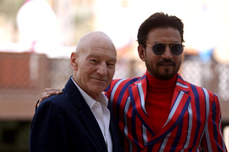 British actor Sir Patrick Stewart and Indian actor Irrfan Khan pose during a photo call at the Dubai International Film Festival in Dubai in 2017. AFP
