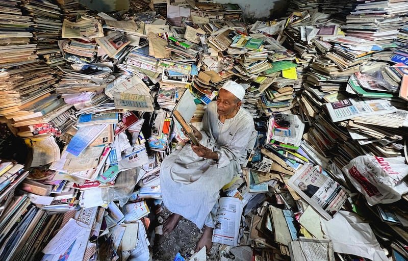 Abdallaa Abu Dawh, 82, in the library of his home in Dakahlia governorate, north of Cairo. Reuters