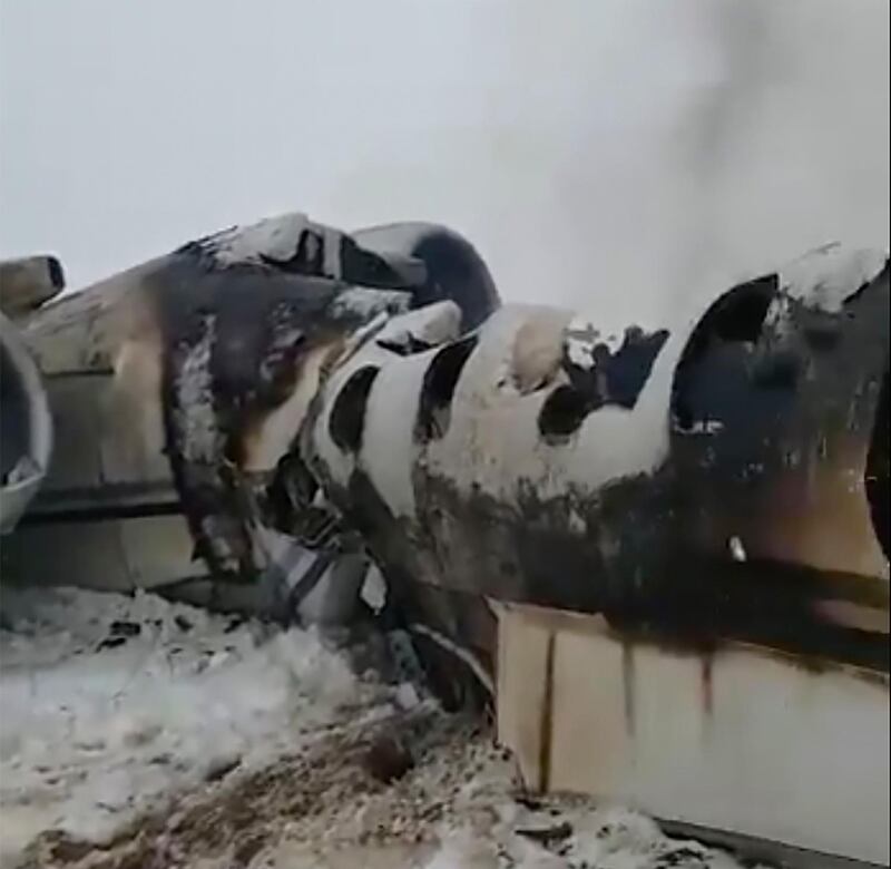 An aircraft that crashed in eastern Afghanistan on Monday, January 27, 2020. Tariq Ghazniwal via AP