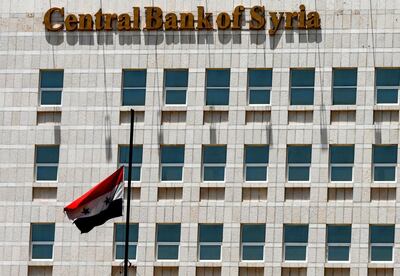 This picture taken on June 17, 2020 shows a view of the facade of the Central bank of Syria in the capital Damascus' Sabaa Bahrat Square.  / AFP / LOUAI BESHARA
