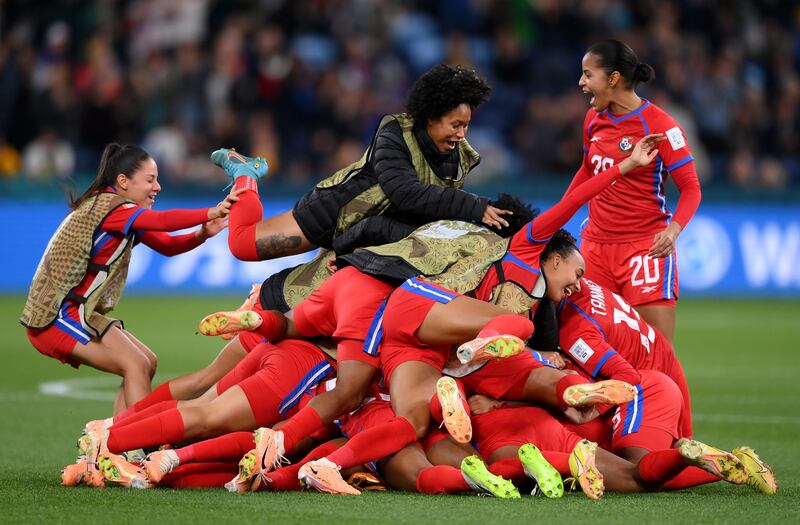 Marta Cox of Panama (obscured) celebrates with teammates after scoring her team's first goal of the Fifa Women's World Cup against France in Sydney. Getty Images