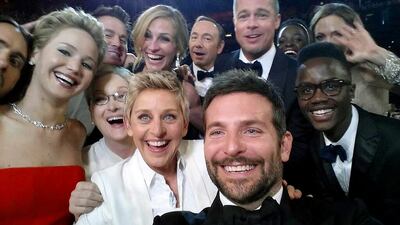 Ellen DeGeneres takes that famous Oscar selfie (pictured) with a gaggle of celebs, causing Twitter to crash for 20 minutes and beating the previous champion for retweets, a photo of Barack and Michelle Obama. Ellen DeGeneres / AP Photo