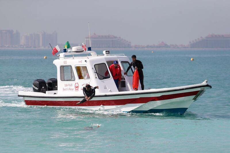 DUBAI, UAE. February 03, 2015 - Members of Dubai Police Search and Rescue team perform rescue scenario drills from a patrol boat on Umm Suqeim Beach in Dubai, February 03, 2015. (Photos by: Sarah Dea/The National, Story by: Dana Moukhallati, News)
 *** Local Caption ***  SDEA030215-seapatrol15.JPG