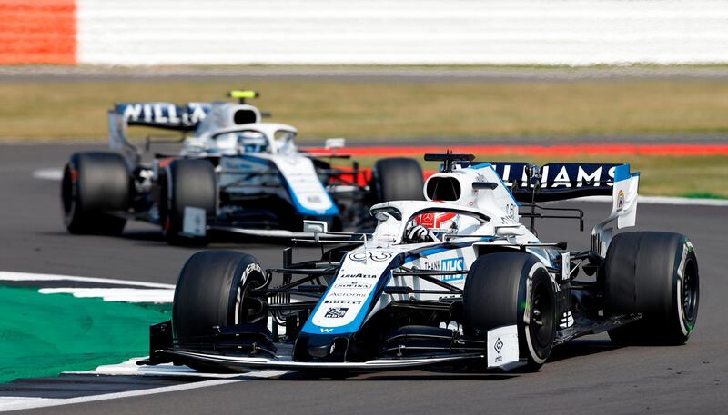 Williams' British driver George Russell, right, leads his teammate Nicholas Latifi at the 70th Anniversary Grand Prix at Silverstone on August 9. AFP