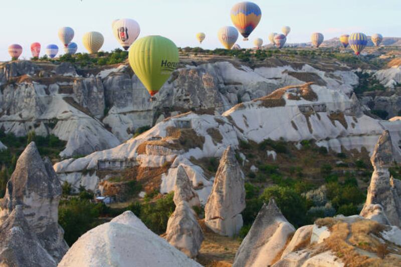 7. Hot air balloons glide over the historical Cappadocia region, located in Nevsehir province of Turkey. Getty Images