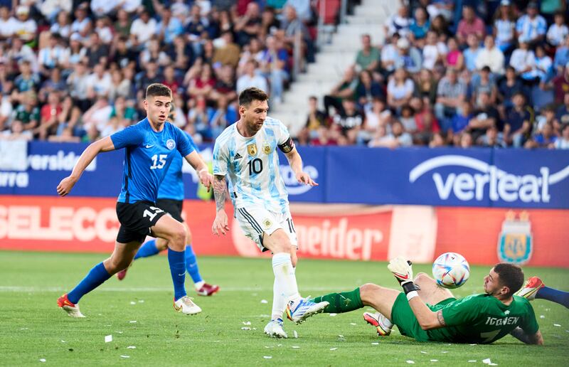 Lionel Messi of Argentina scoring his team's fourth goal during the international friendly match against Estonia at Estadio El Sadar on June 05, 2022 in Pamplona, Spain. Getty Images