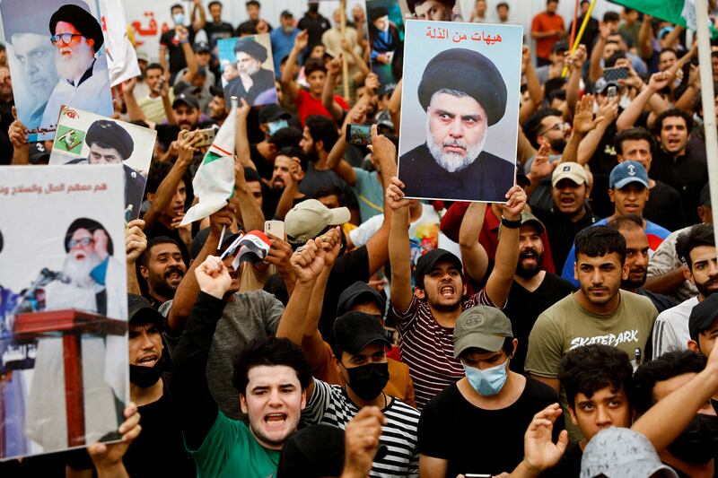 Iraqi Shiite cleric Muqtada Al Sadr's decision to stand down his bloc's MPs absolves him of efforts to form a government. Reuters