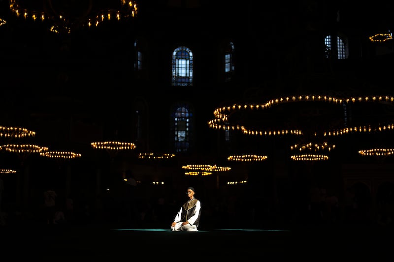 A Muslim worshipper in the Byzantine-era Hagia Sophia Grand Mosque, during the first day of Eid Al Adha in Istanbul. AP
