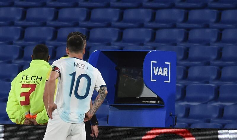 Argentina's Lionel Messi watches the VAR screen. AP